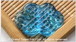 Glass Carved Infinity Knot